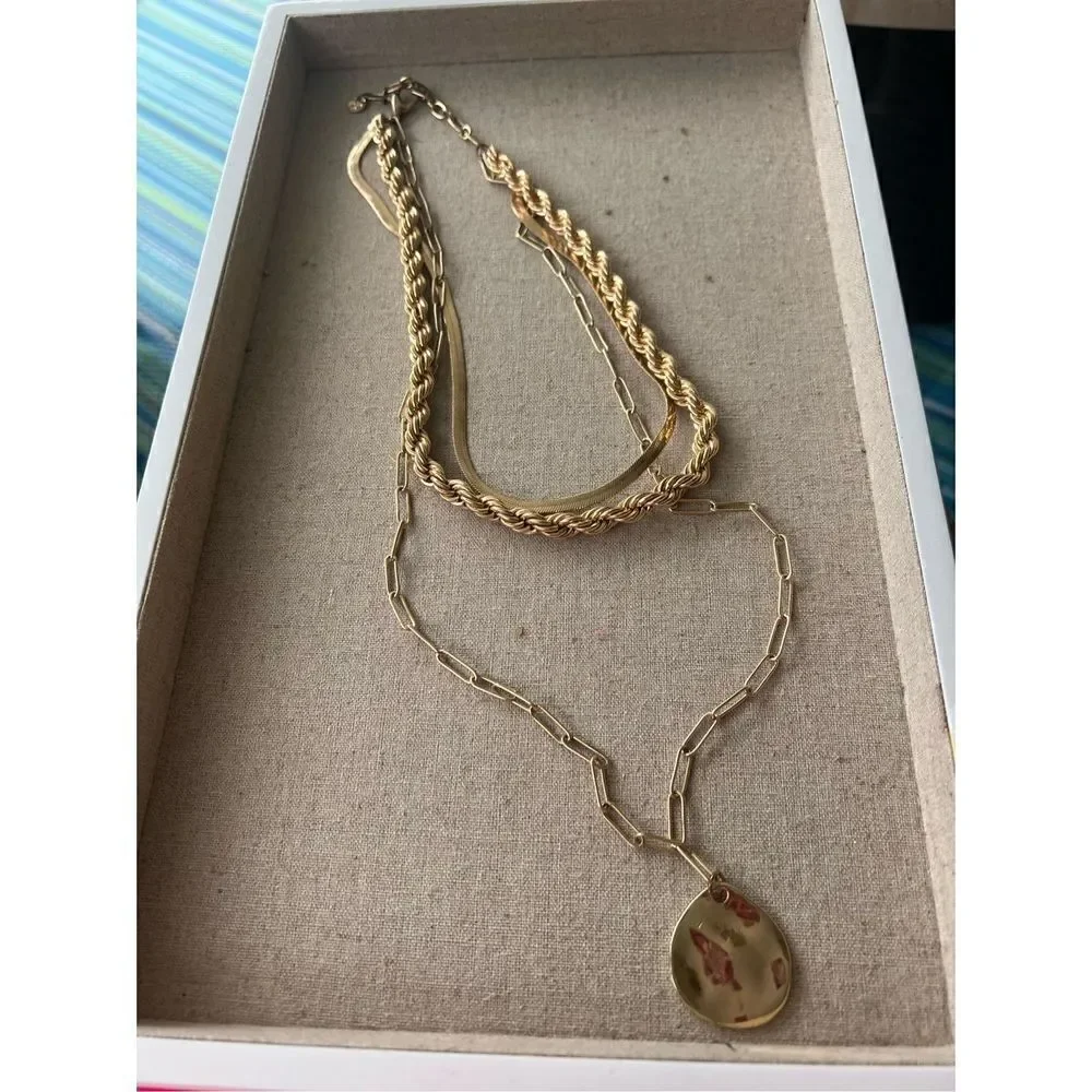Chunky Gold necklace layered look